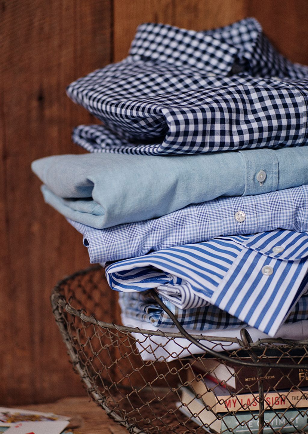 A stack of men's button up shirts.