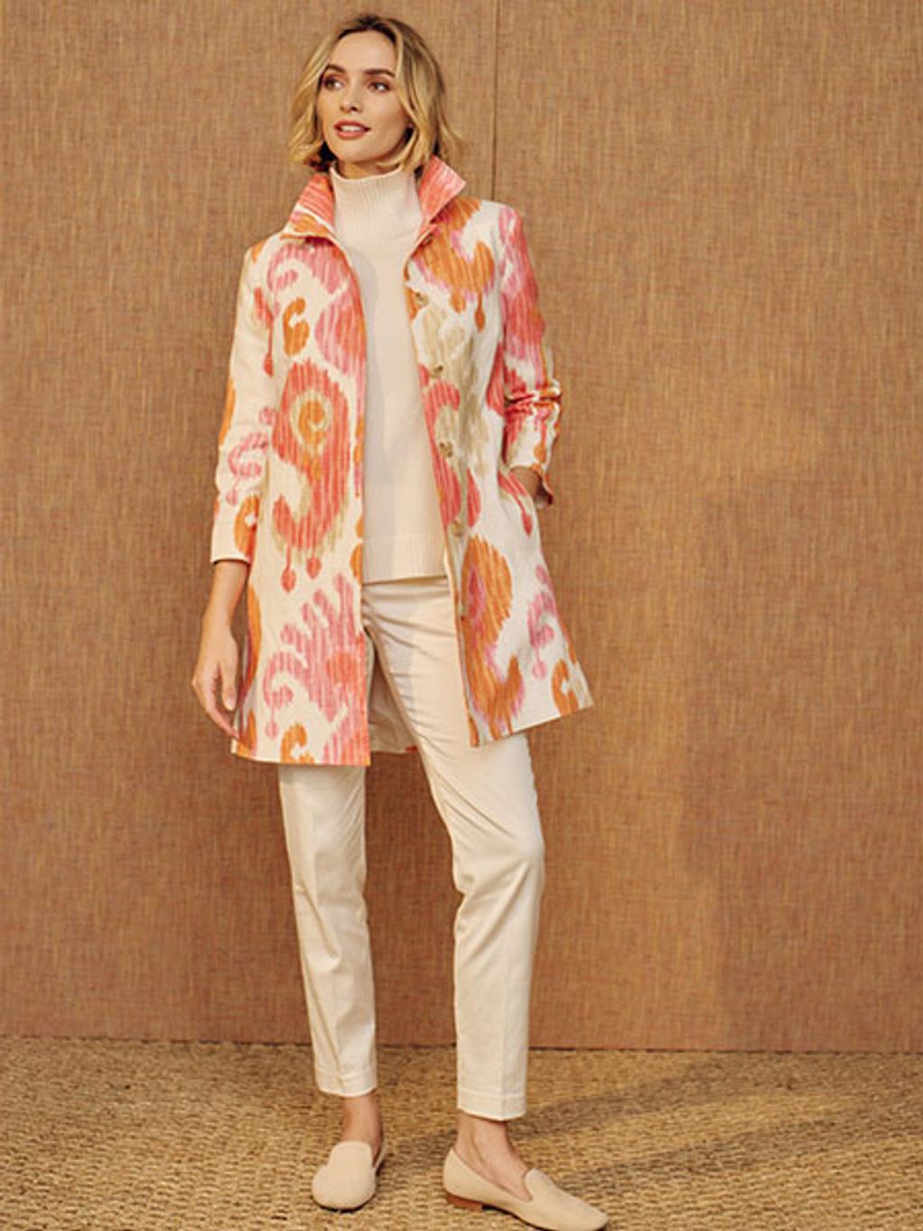Model wearing ikat coat, turtleneck, and pants
