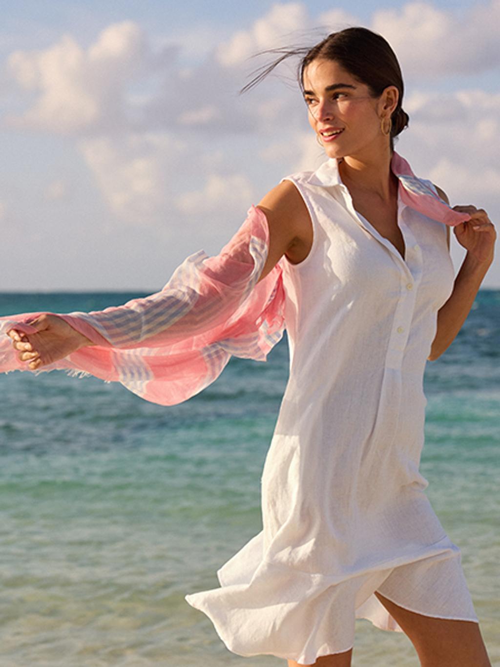 Model wearing linen shirtdress and scarf.