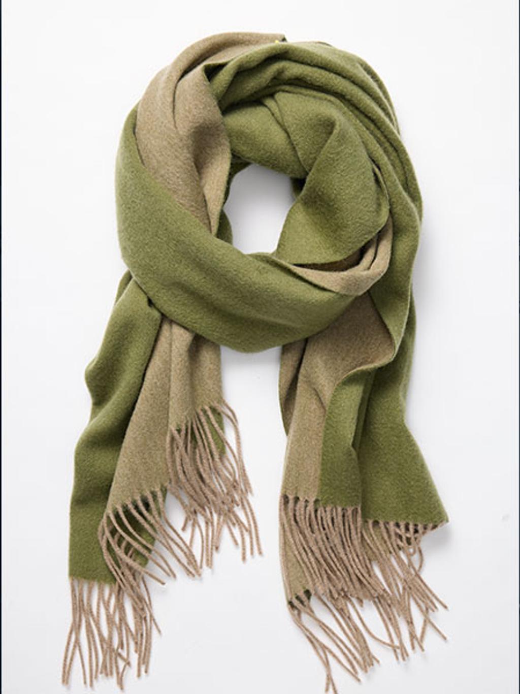 Product laydown of green cashmere scarf Product laydown of green cashmere scarf