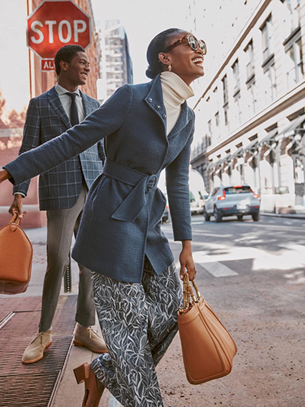 Model wearing tweed car coat.