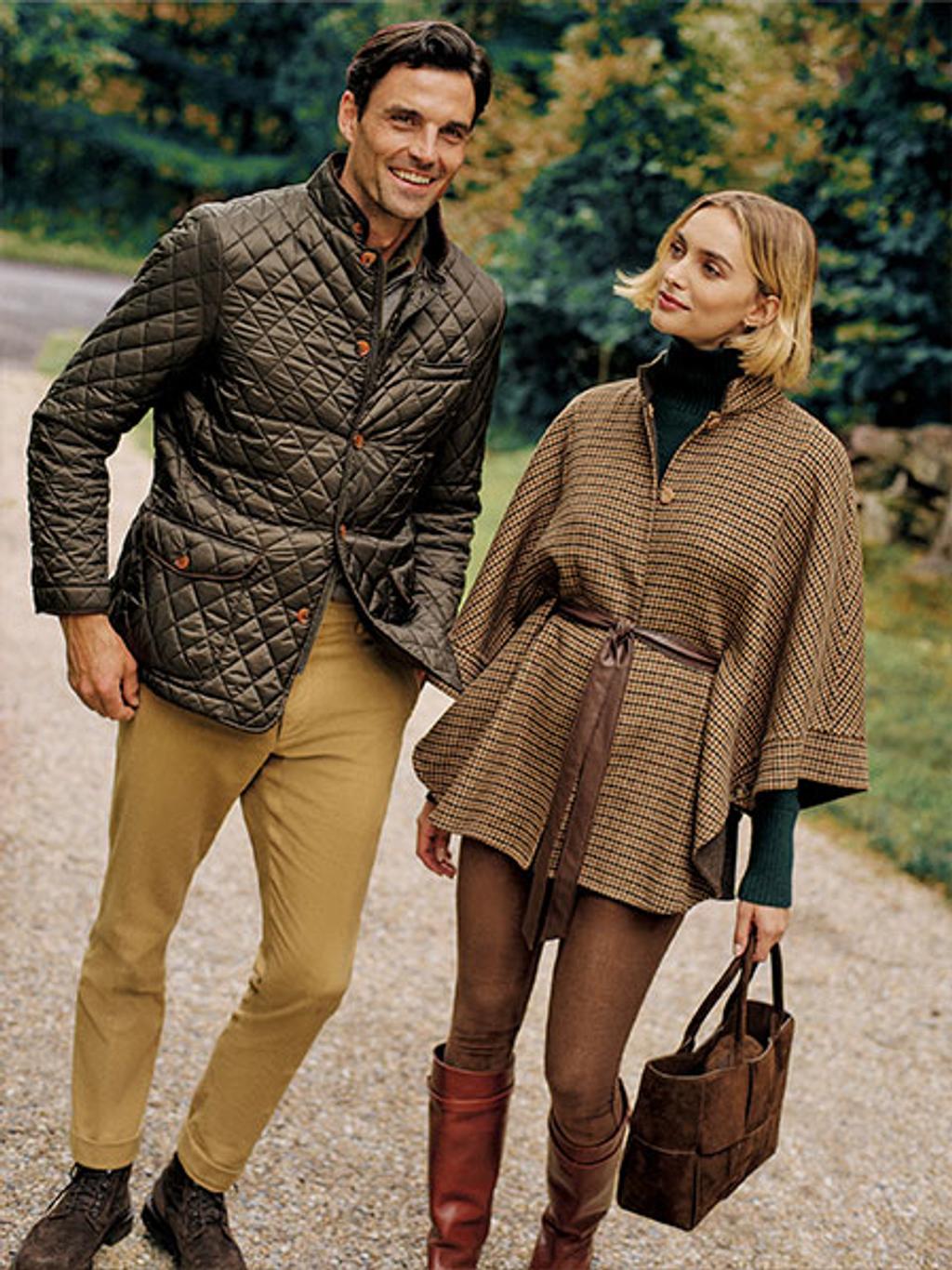Man and woman walking outside in fall outerwear