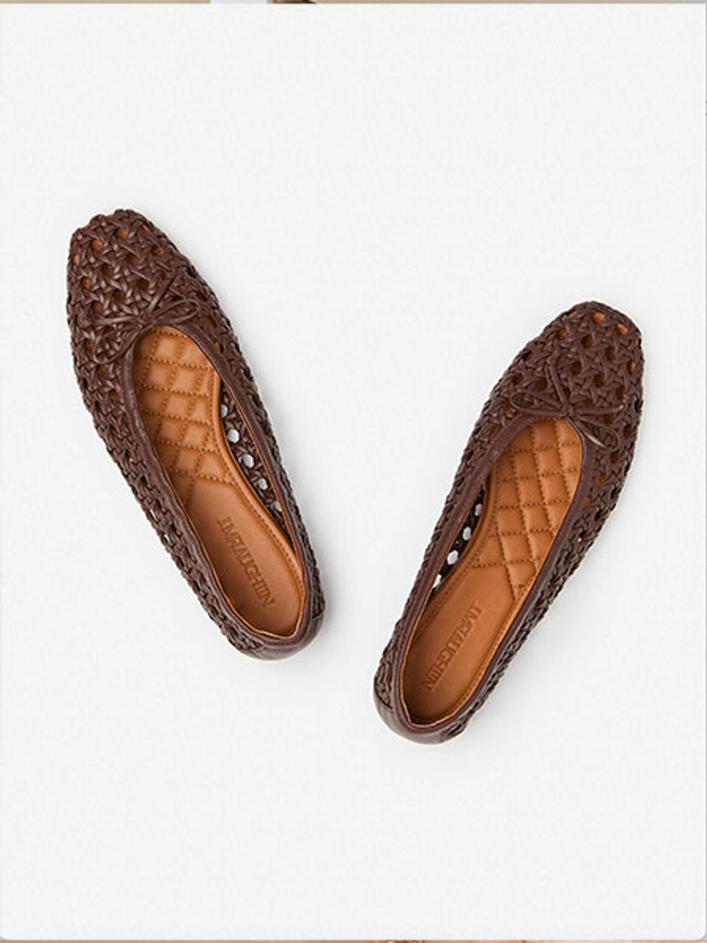 Still shot of woven ballet flats