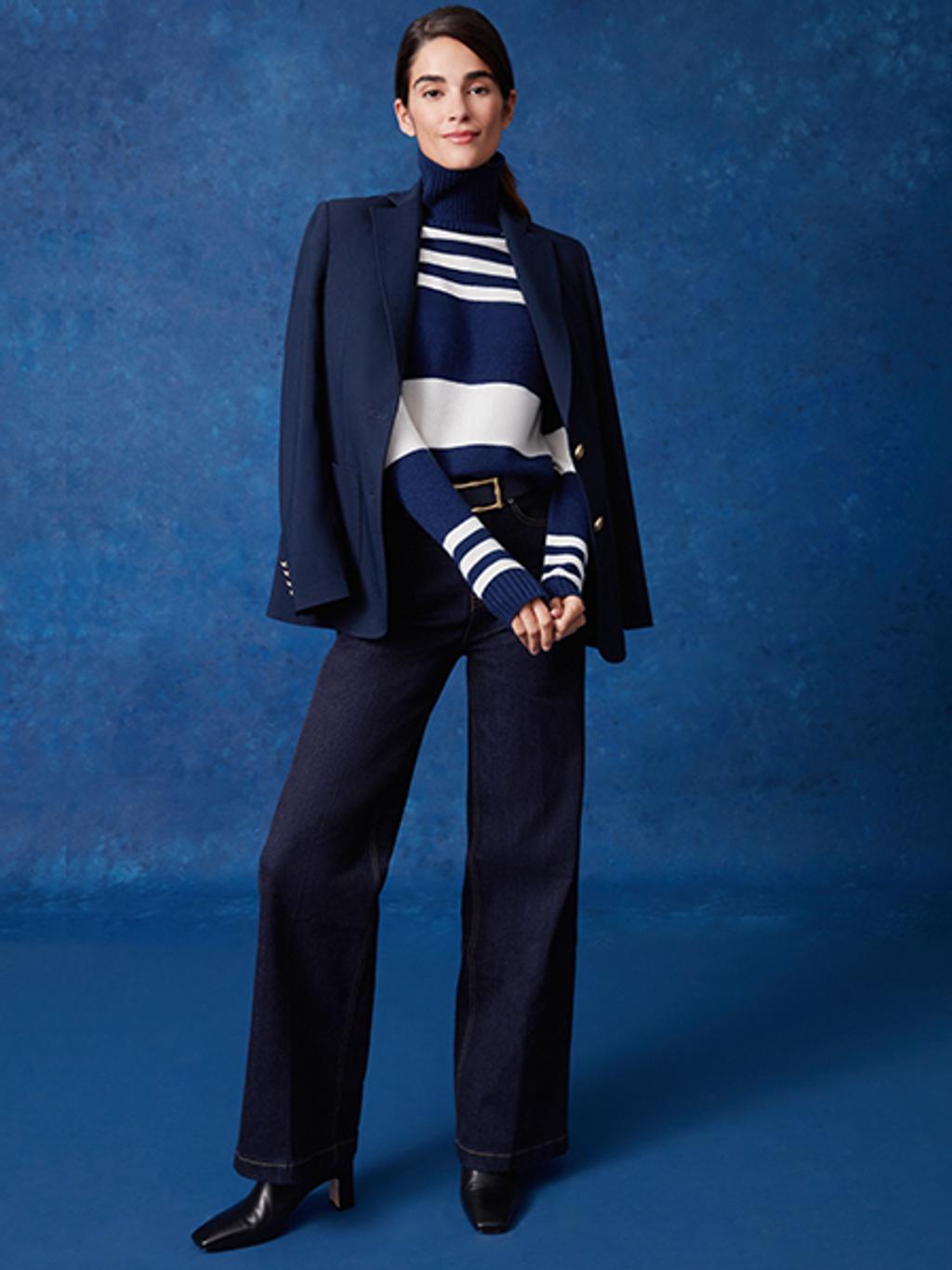 Model wearing wrinkle-free navy blazer.