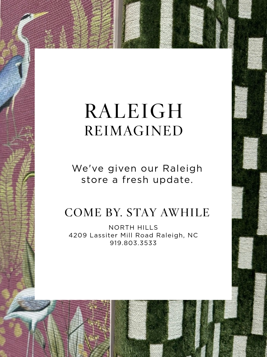 Advertisement: "Raleigh Reimagined" announces a store update at North Hills, 4209 Lassiter Mill Road, Raleigh, NC, displayed over patterned fabrics.