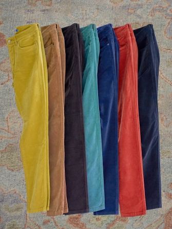laydown of womens velvet jeans in various colors