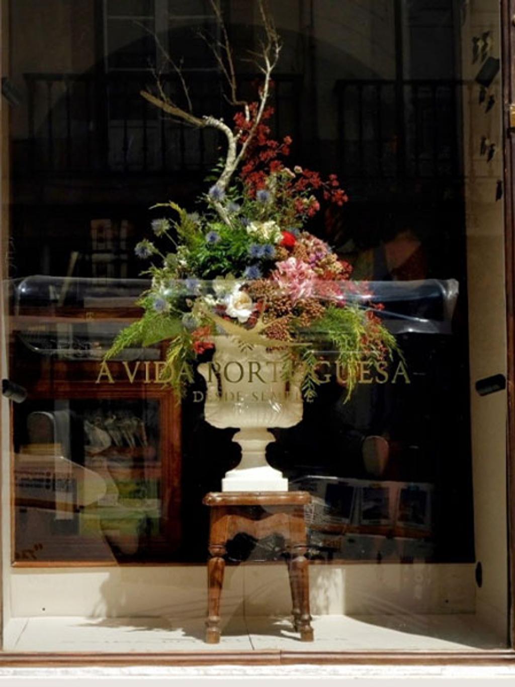 Storefront with flowers of A Vida Portuguesa Storefront with flowers of A Vida Portuguesa