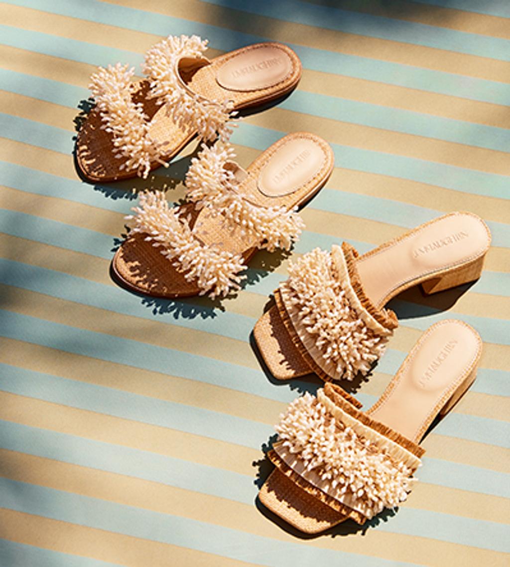 Still shot of two pairs of beaded slides