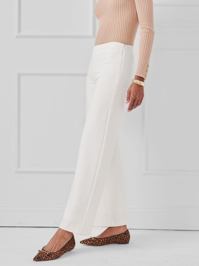 profile image of woman in wide leg egret white trousers