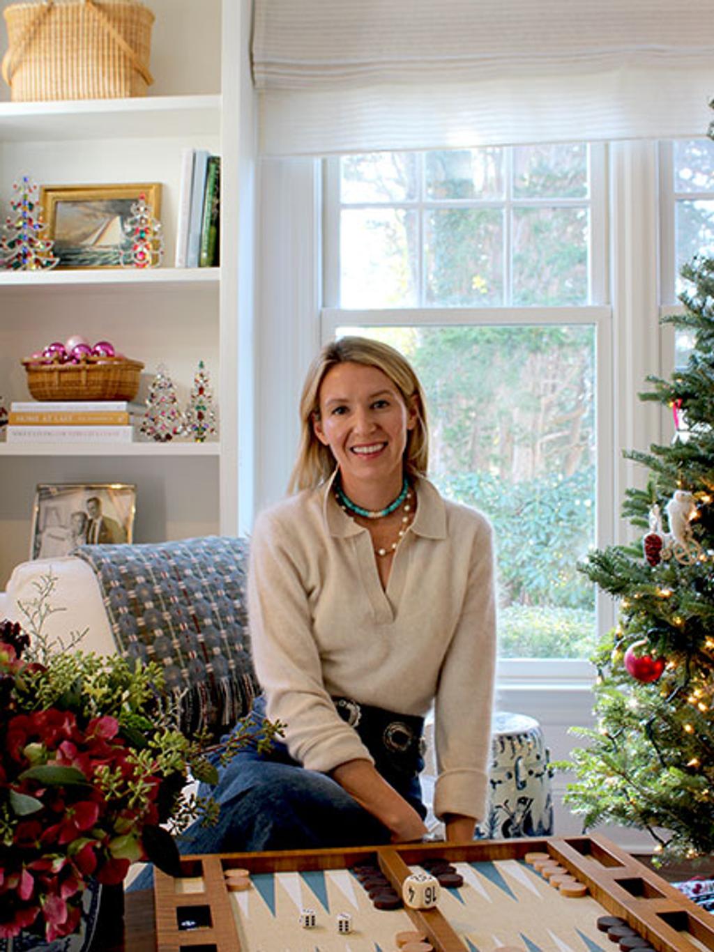 Jessica Schumacher in living room with backgammon board