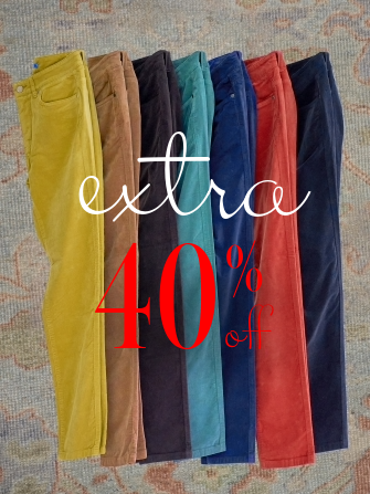 laydown of womens velvet jeans in various colors