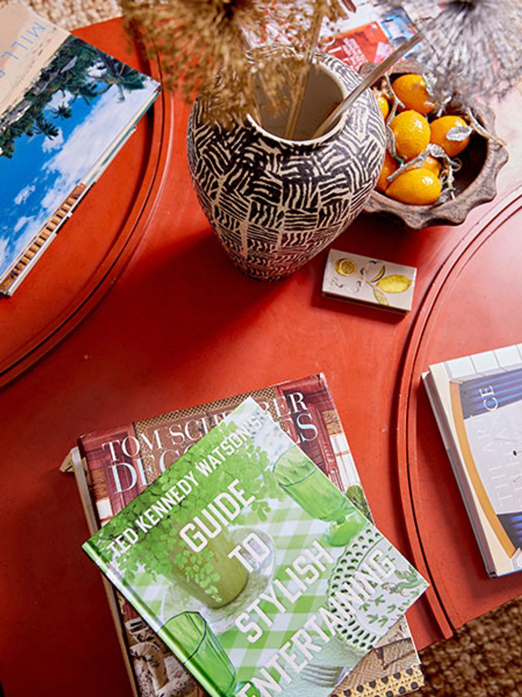 Vase and coffee table books Vase and coffee table books