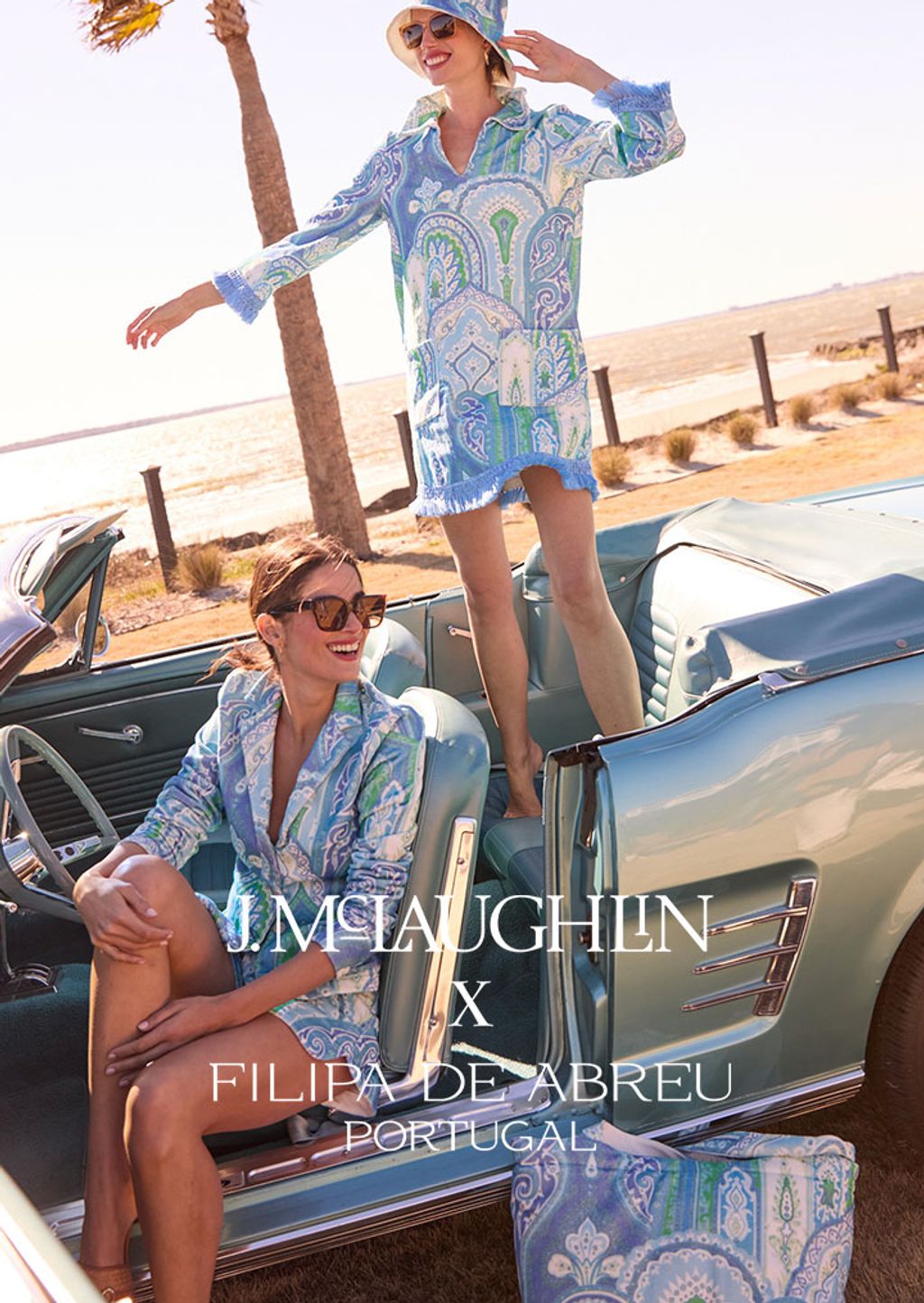 2 models posing with a vintage car wearing the Filipa Collection