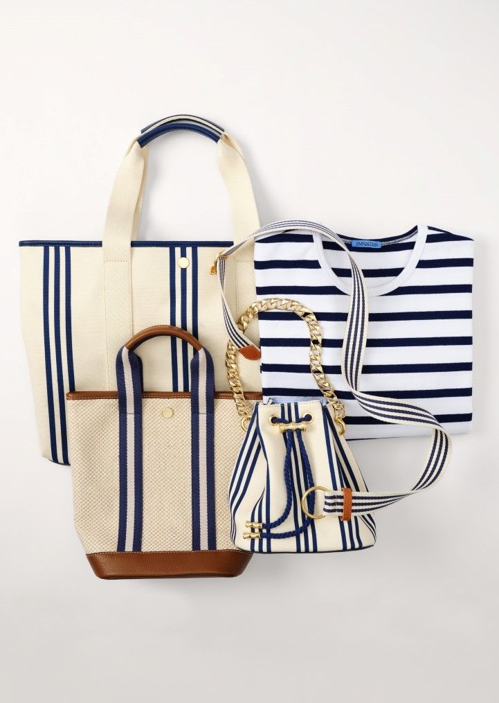 Nautical-themed items: three cream and navy striped bags and a folded striped t-shirt.