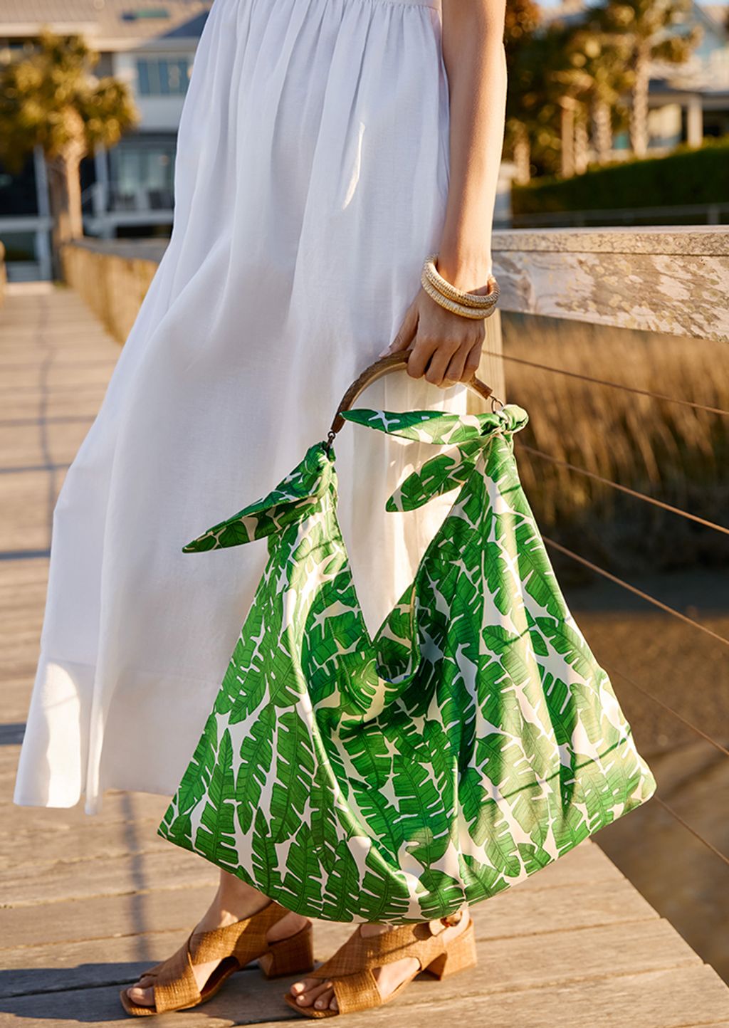 Women holding a scarf bag