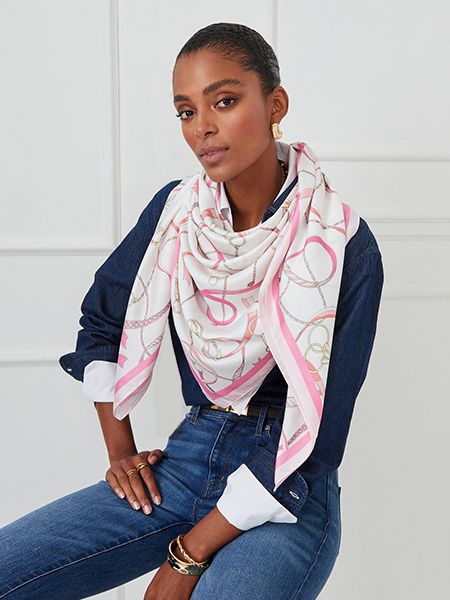 Navy blazer outfit styled with pink ribbon awareness scarf, multiple styling options shown