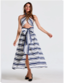 Woman in a blue and white striped two-piece halter top and long skirt.