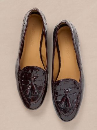 laydown of womens patent croc embossed loafers