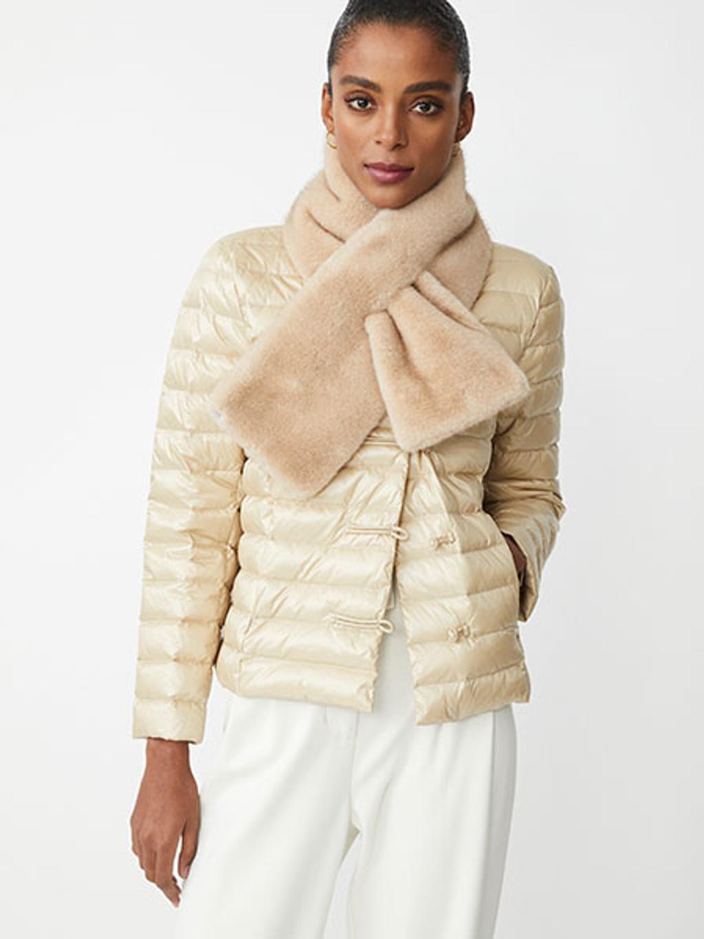 Model wearing puffer jacket with faux-fur scarf Model wearing puffer jacket with faux-fur scarf