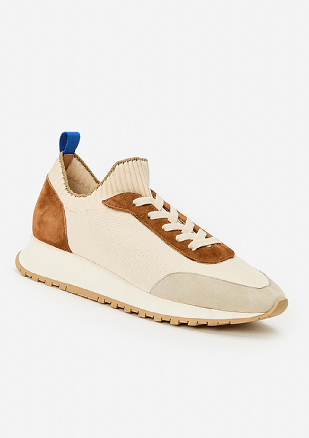 Tonal sneakers with suede and leather accents.