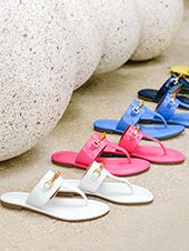 Women's colorful sandals in a row