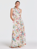 Woman in a sleeveless white floral maxi dress.