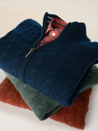 stack of mens cashmere cable zip cardigan sweaters