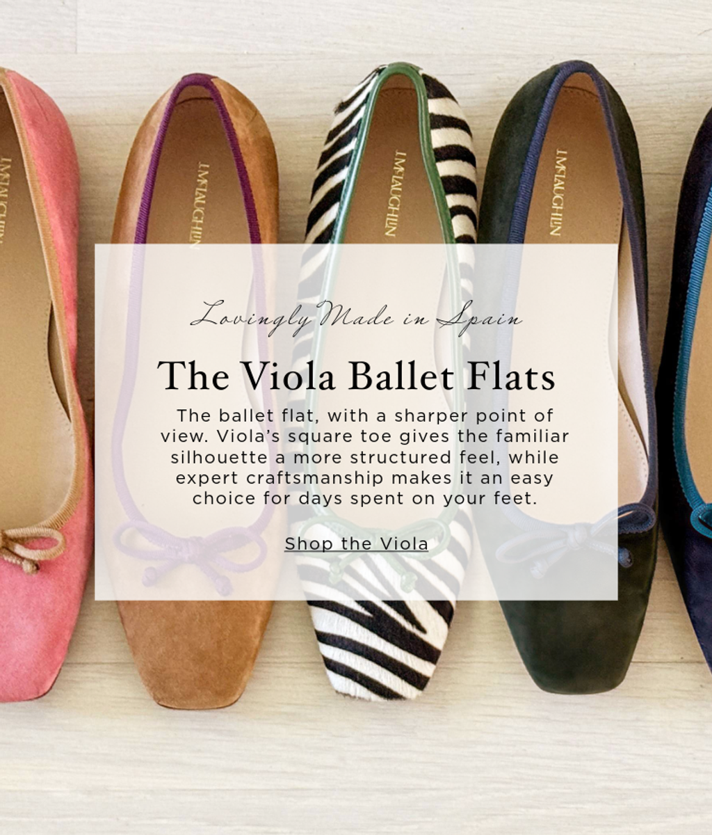 An ad featuring five ballet flats: pink, tan, zebra print, dark green, and dark blue, with overlay text "Lovingly Made in Spain", "The Viola Ballet Flats", and "Shop the Viola".