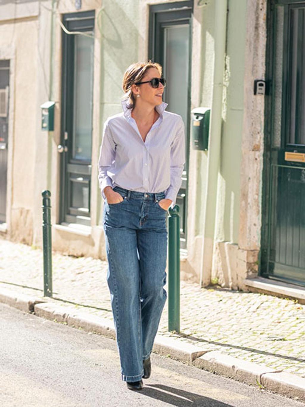 Filipa in striped shirt and wide-leg jeans Filipa in striped shirt and wide-leg jeans