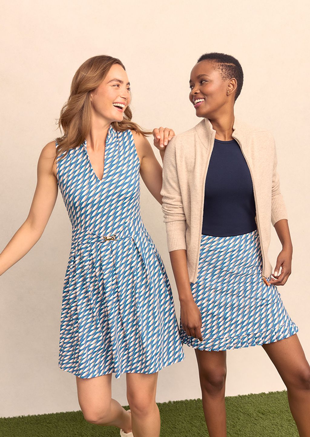 Models wearing athletic style attire with a blue geometric print.