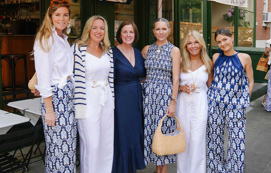 JMcL Team in blue and white