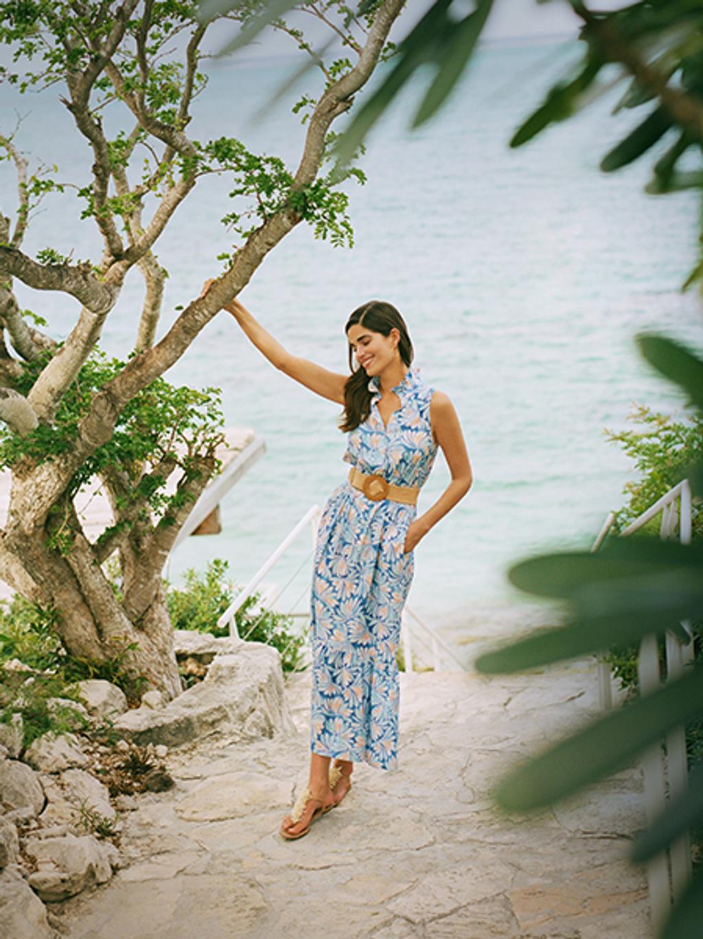 Woman in blue floral dress