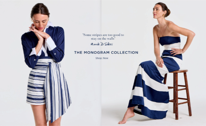 Two women model navy and white striped outfits from The Monogram Collection: one in a shirt and striped shorts, the other in a strapless maxi dress.