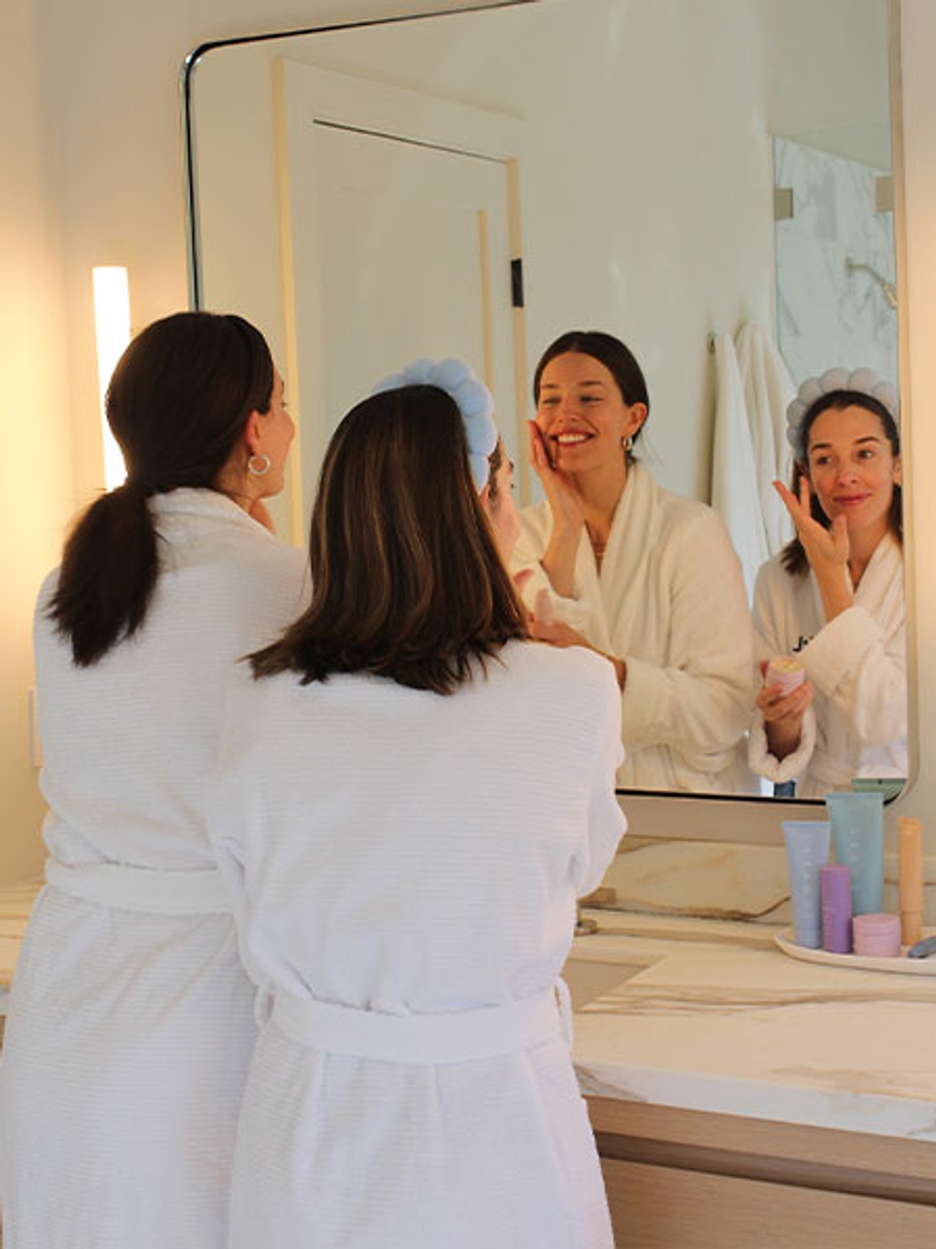 Emily and Christina doing their skincare routines Emily and Christina doing their skincare routines