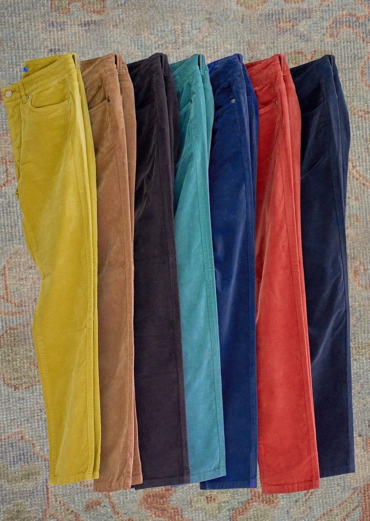 flat lay of womens velveteen jeans in assorted colors