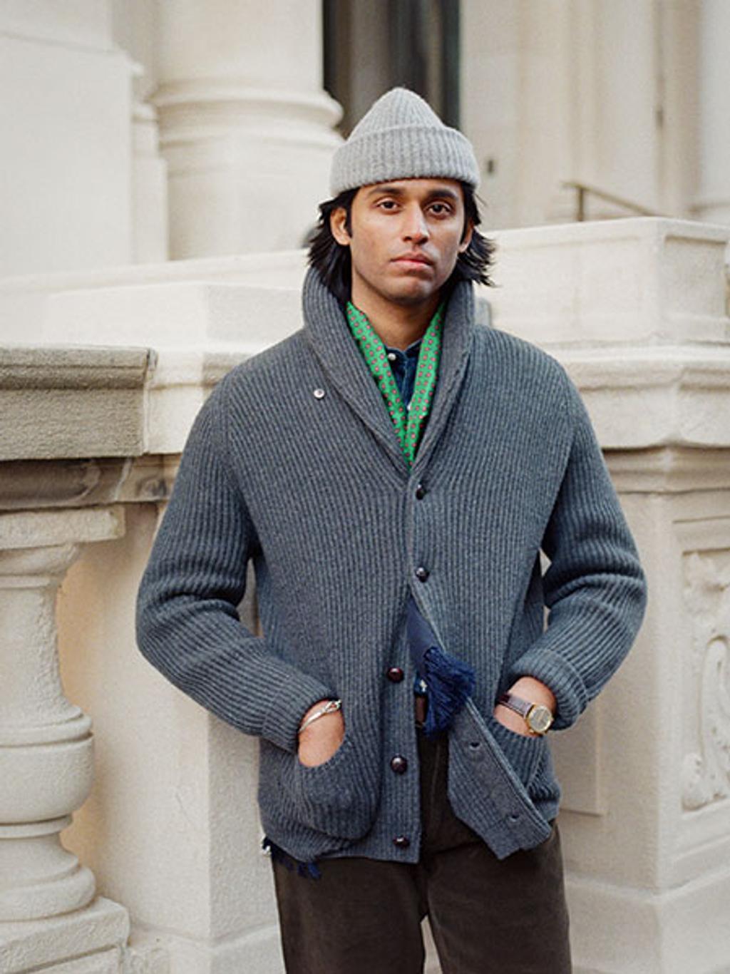 Model wearing a navy cardigan and light gray beanie. Model wearing a navy cardigan and light gray beanie.