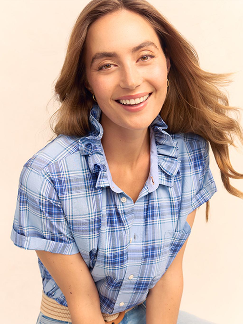 Model wearing limited-edition J.McLaughlin x KMJ shirt.
