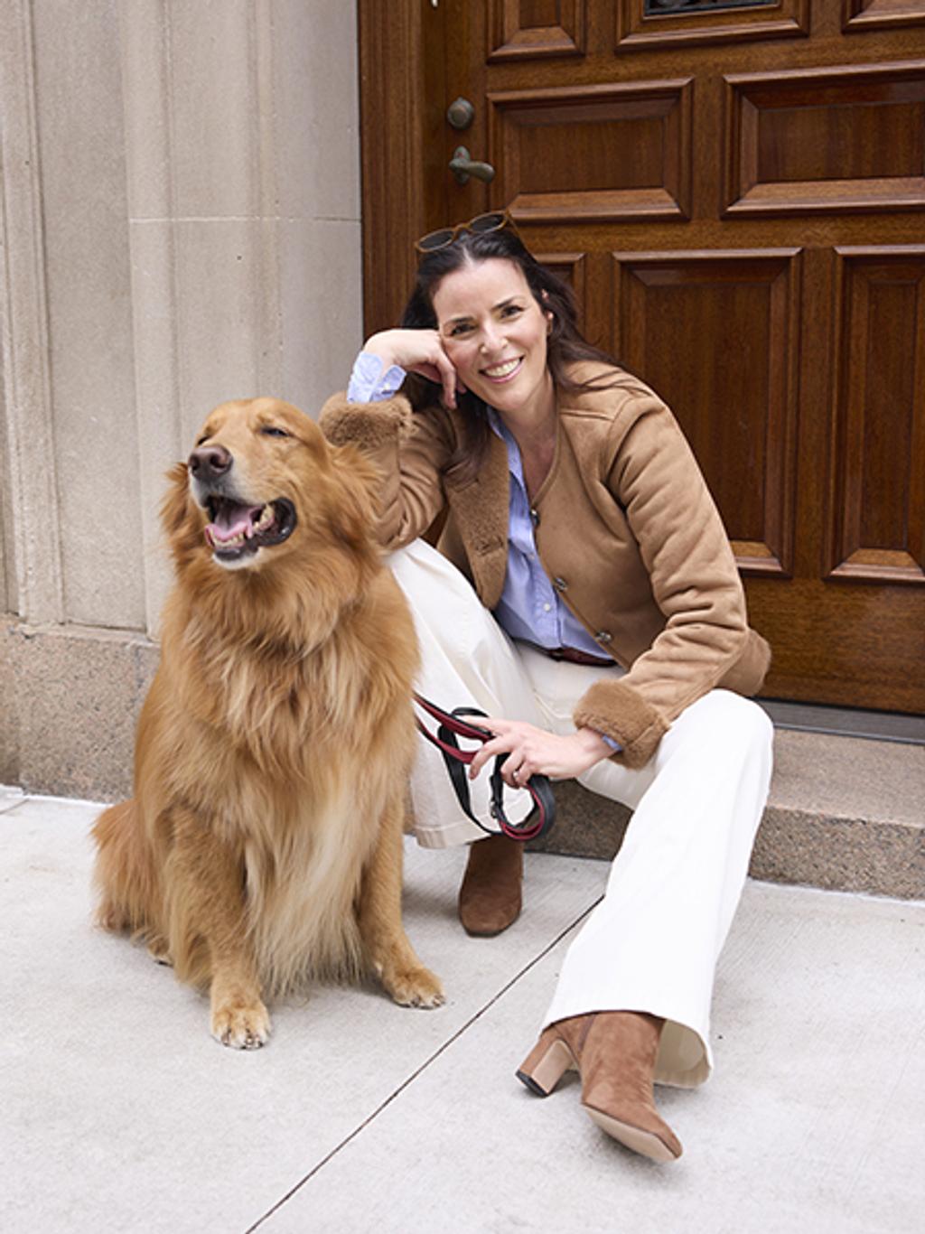 Ann Caruso in faux suede jacket, shirt, and white jeans