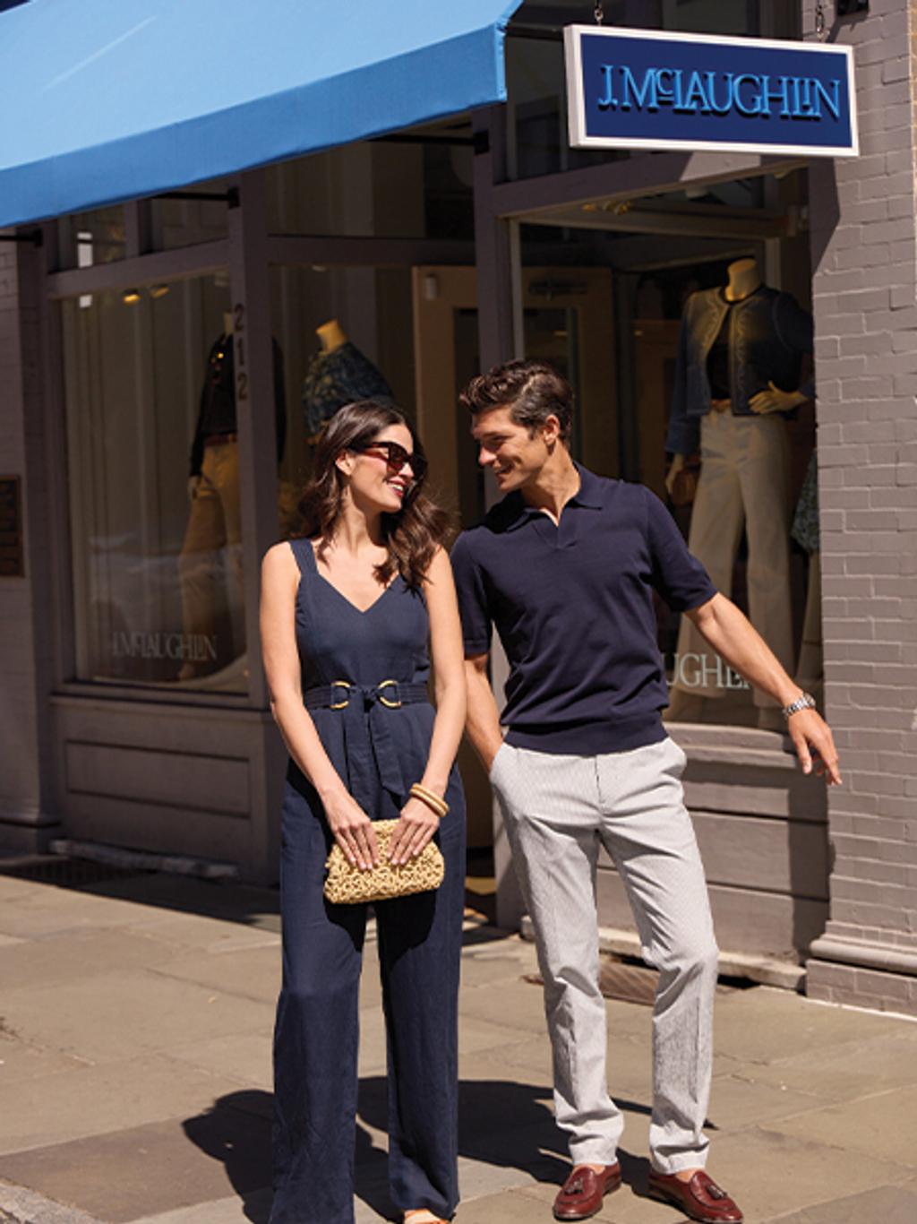 Male and female models in front of J.McLaughlin Charleston store