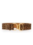 still life of womens medium thickness leopard print belt with brass ring clasp closure