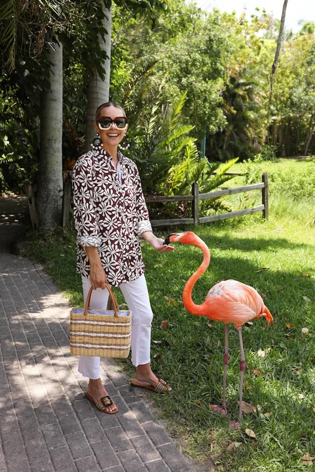 Blair Eadie carrying a wicker bag