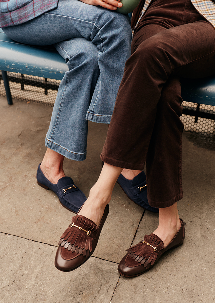 model wearing lois top, watson and pant and loafer in green.