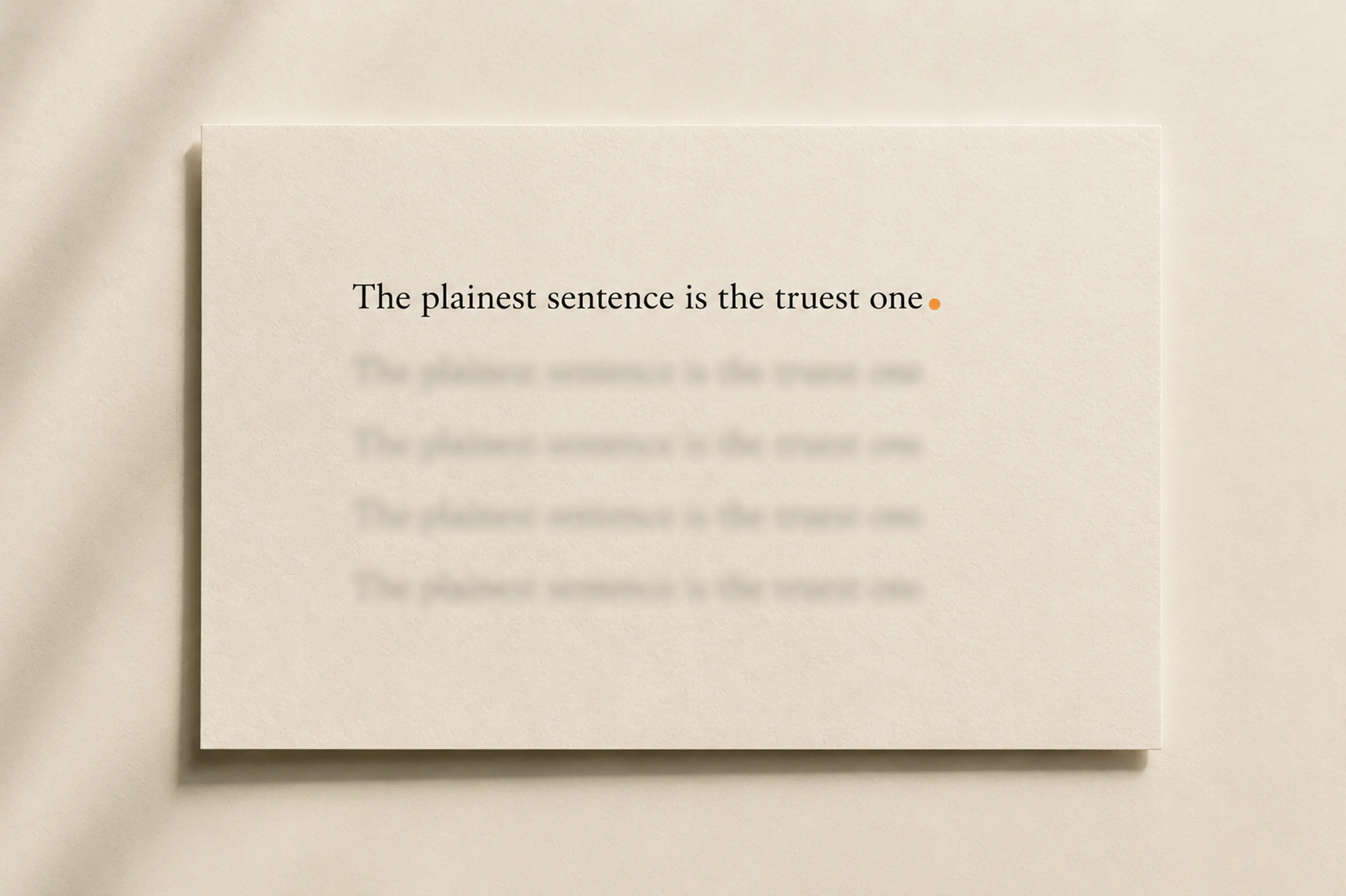 A single sharp sentence above blurred repetitions of the same line