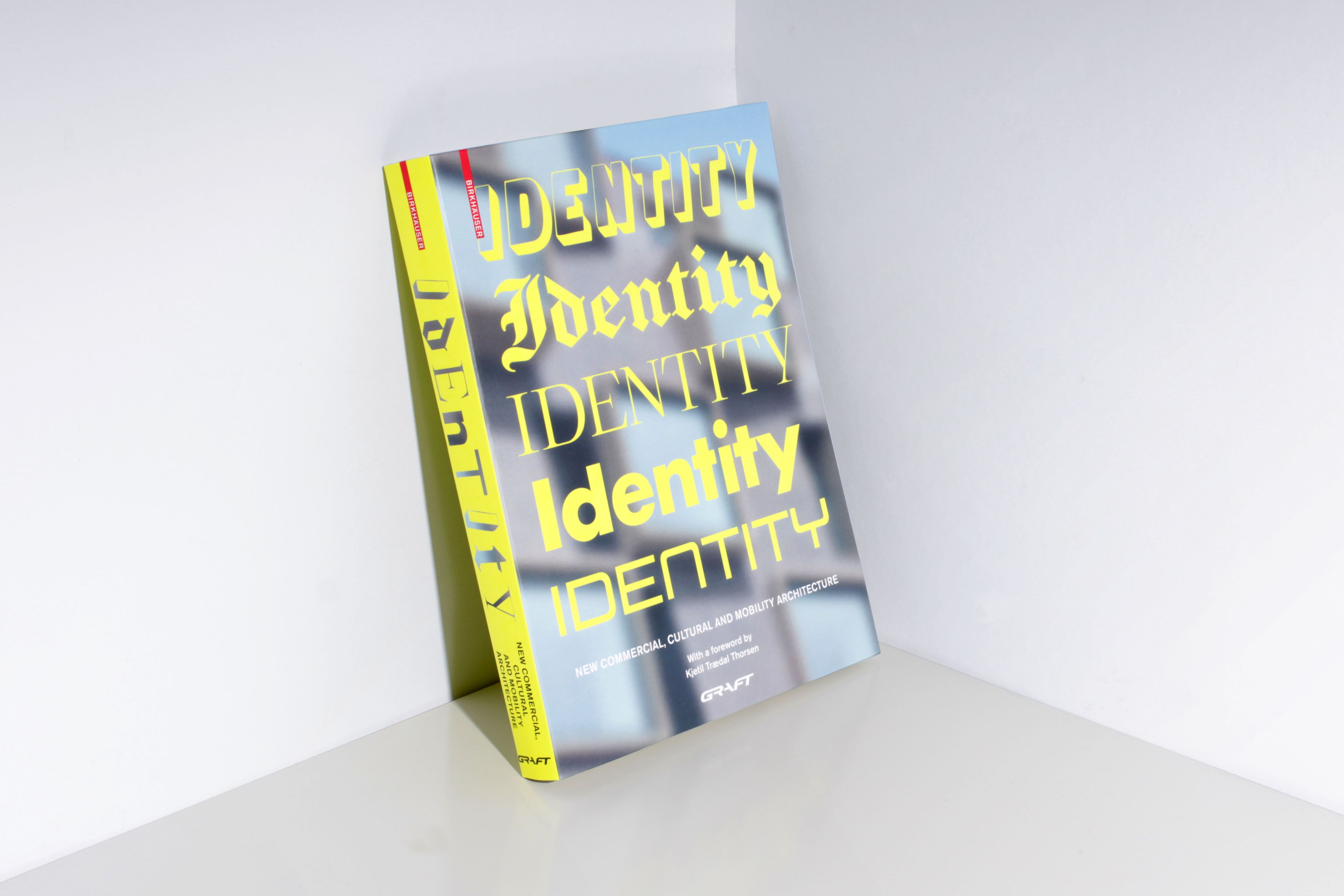 IDENTITY. New Commercial, Cultural and Mobility Architecture Author		GRAFT Project type	Publication Language	English Publisher	Birkhäuser  Paperback	360 pages Published	October 12, 2020  ISBN-10	3035619166 ISBN-13	978-3035619164   The international and multidisciplinary practice GRAFT conceives of itself as a label for architecture, urban design, product design, and music. GRAFT calls itself a "hybrid office" and produces dynamic architectural designs for standard commissions; however, the architects also initiate their own projects and system solutions for tasks with a social, ecological, or esthetic emphasis.
