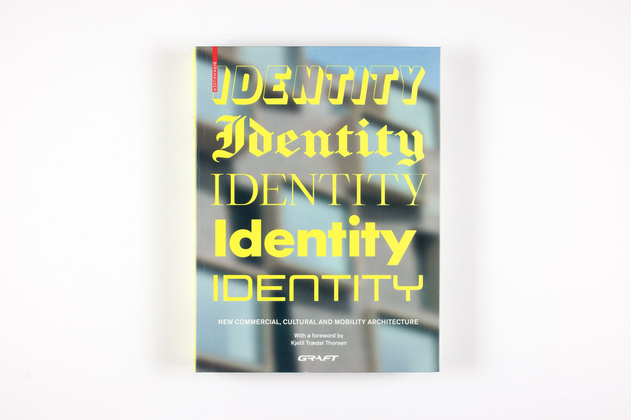 IDENTITY. New Commercial, Cultural and Mobility Architecture Author		GRAFT Project type	Publication Language	English Publisher	Birkhäuser  Paperback	360 pages Published	October 12, 2020  ISBN-10	3035619166 ISBN-13	978-3035619164   The international and multidisciplinary practice GRAFT conceives of itself as a label for architecture, urban design, product design, and music. GRAFT calls itself a "hybrid office" and produces dynamic architectural designs for standard commissions; however, the architects also initiate their own projects and system solutions for tasks with a social, ecological, or esthetic emphasis.