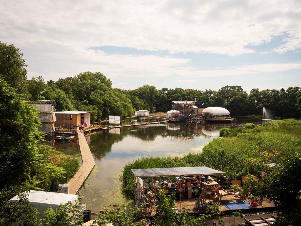 As the land becomes liquid, an association inquires what to build, where to build, and how to build     Water in Berlin is complicated to say the least. In parts of the city the groundwater is dropping. In other parts of the city the groundwater is rising and must be pumped out. Blue pipes, suspended in the air, flow through city streets, rescuing buildings and streets as the land becomes liquid. ¹ ² ³  Mixed messages about water float about in the city. On one hand, people hear that water conservation is increasingly important since there is less rain in the city and region. On the other hand, people are told that they people should use even more water because the water system is not designed for people to use less water. ⁴ ⁵ ⁶   In spring 2020, I was awarded the GRAFT Travel Grant to travel to Germany and work on a project called Floating University Berlin. This journal entry tells the story of the collective design process Floating’s association members underwent to envision the project’s future architecture and infrastructure.