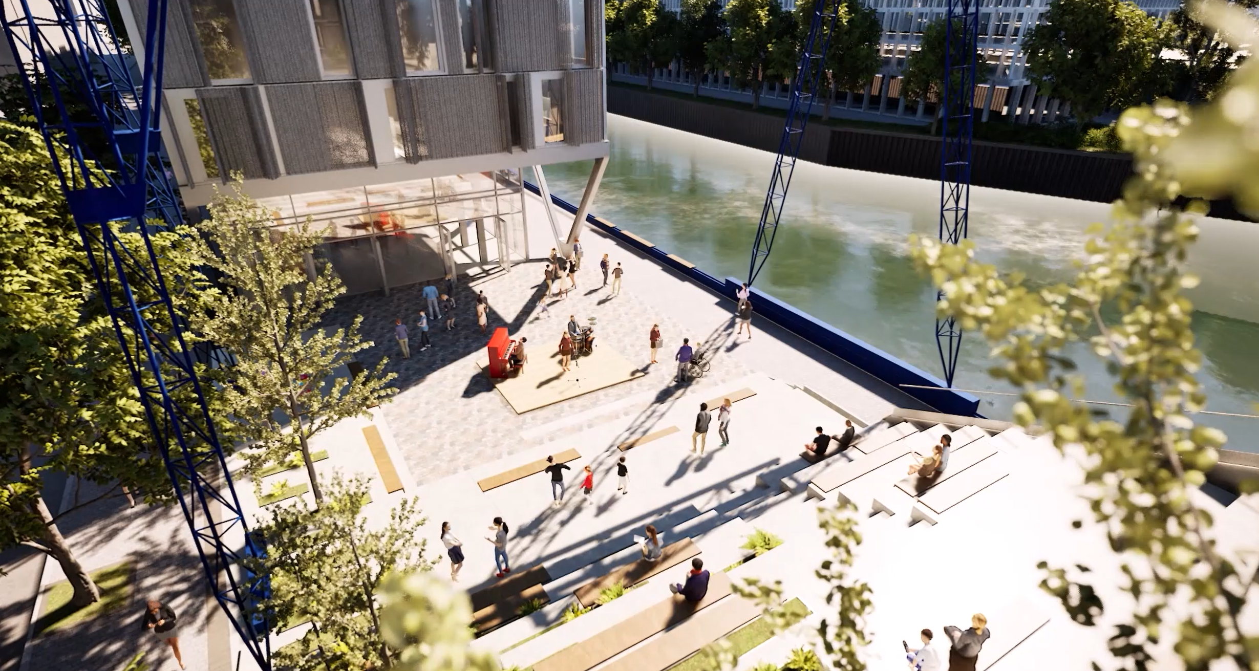 ein urbaner Stadtplatz mit üppigem Grün neben einem Kanal, Sitzstufen und eine Bühne.