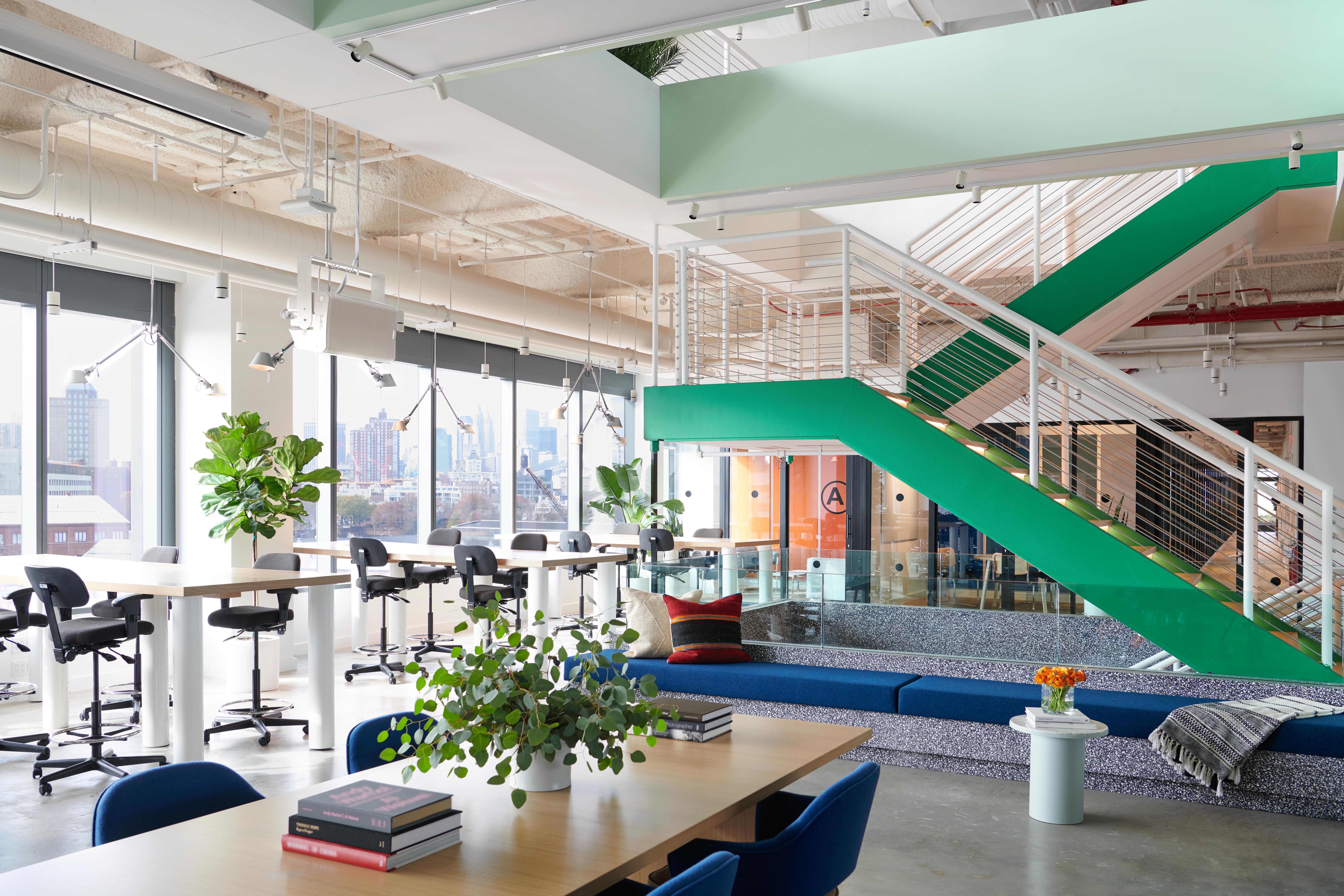 Common areas at WeWork blend work and leisure zones to provide diverse workspaces