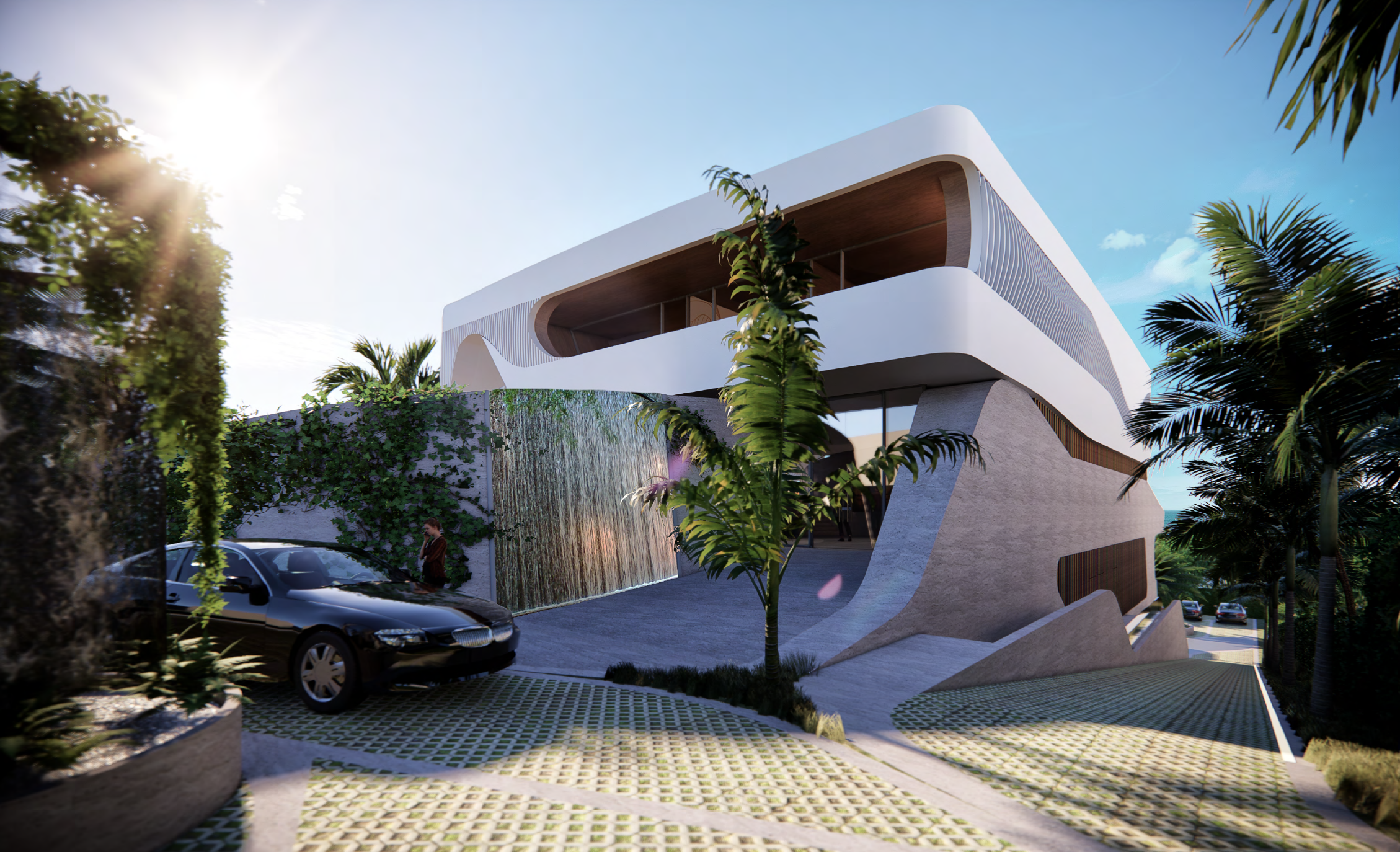 Modern architectural house with curved walls and large windows, surrounded by palm trees and greenery.