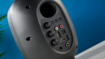 the majority d80 speakers, a pair of black egg-shaped speakers with mesh casing, HDMI, bluetooth, aux connectivity